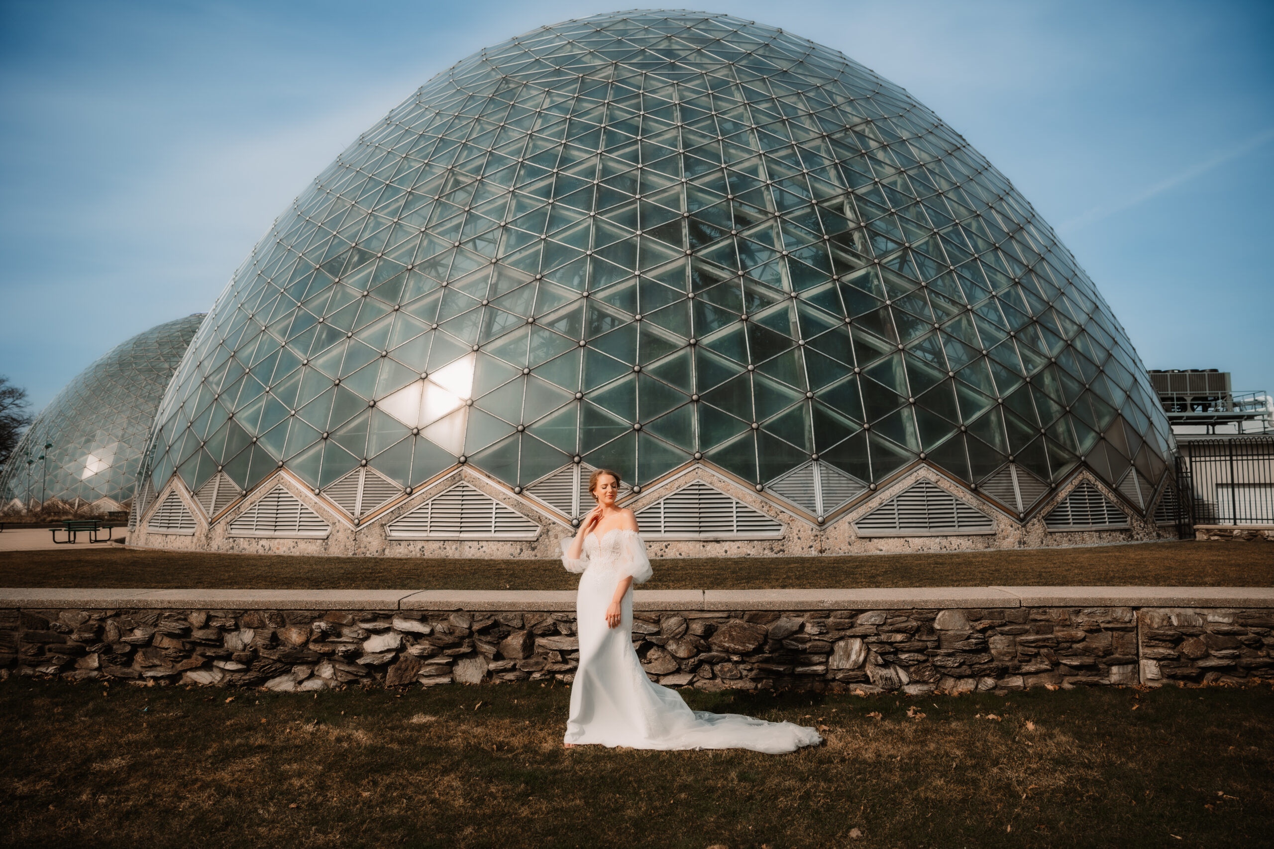 bride outside of domes in direct sunlight